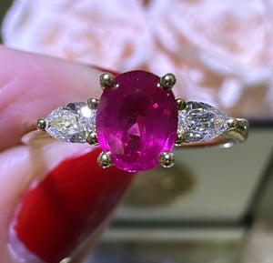 0.91ct tw Three Stone Ruby Oval Center with Pear Side Diamonds Ring