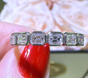 0.69ct tw Emerald Cut Diamond Bezel Set Half Eternity Band