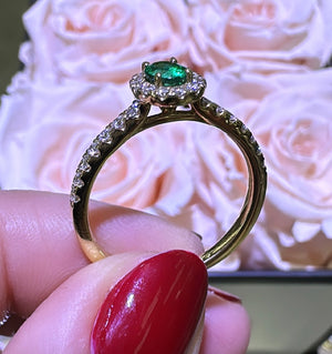 Oval Emerald Halo Ring 0.64ct tw