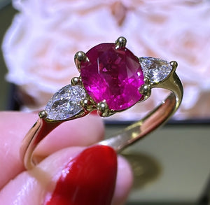 0.91ct tw Three Stone Ruby Oval Center with Pear Side Diamonds Ring