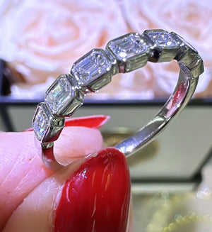 0.69ct tw Emerald Cut Diamond Bezel Set Half Eternity Band