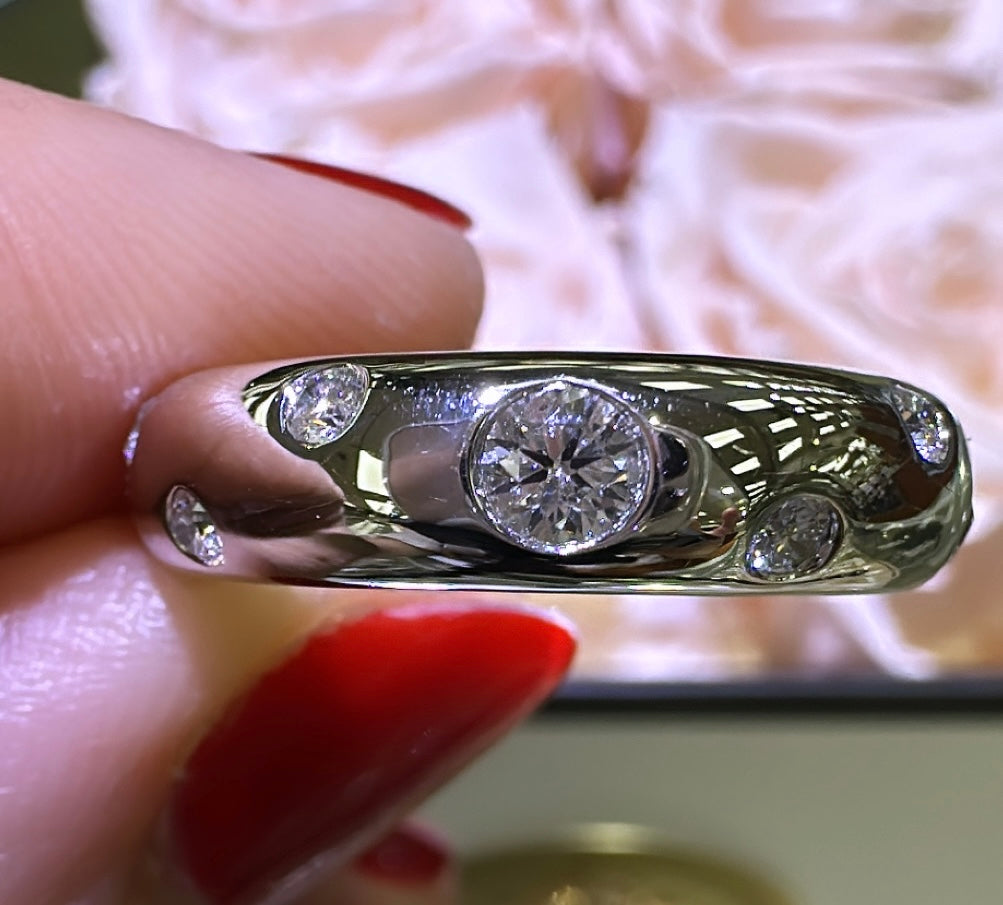 0.54carat Burnish Set Diamond Station Ring