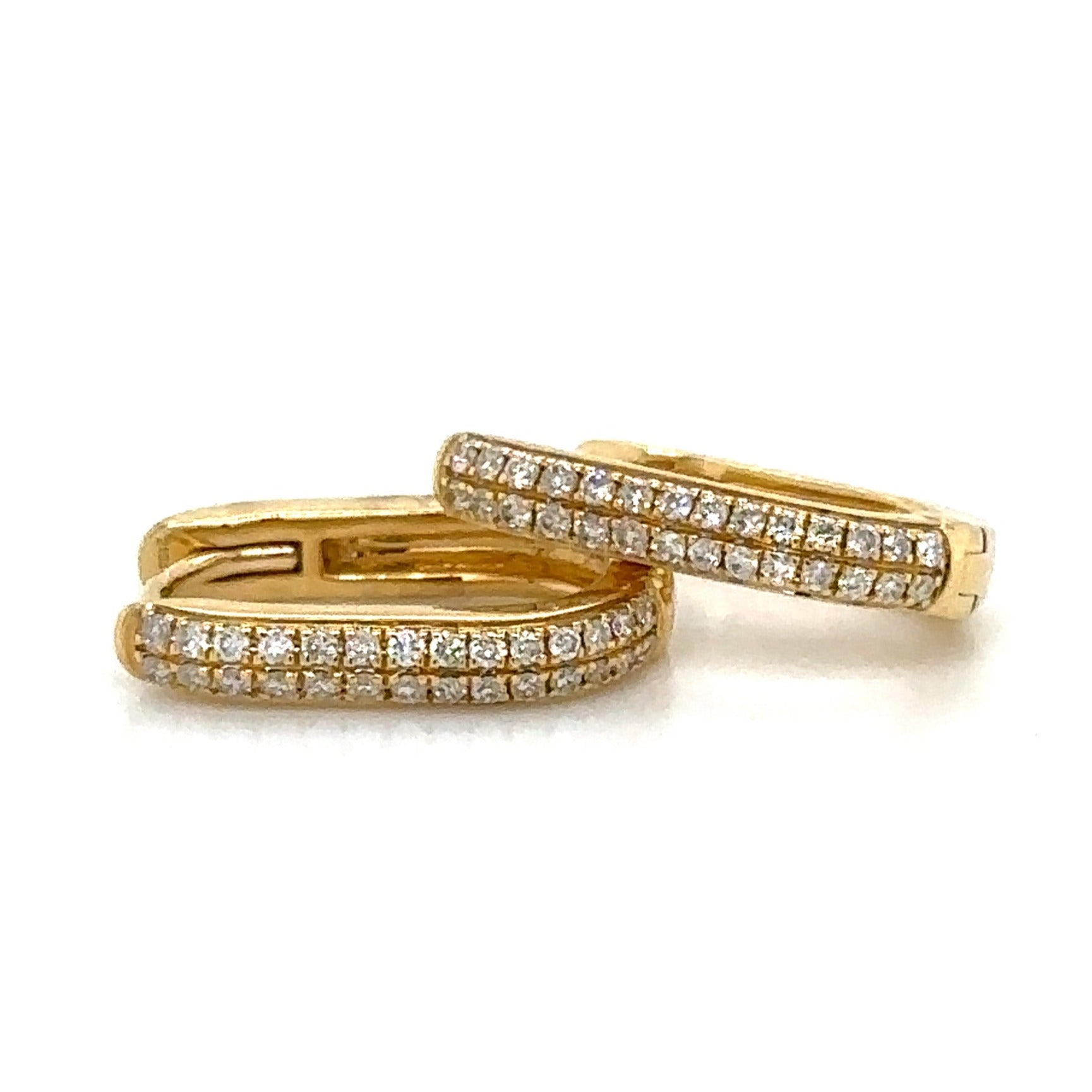 Ladies Diamond Pave Oval Huggie Earrings 0.18ct tw