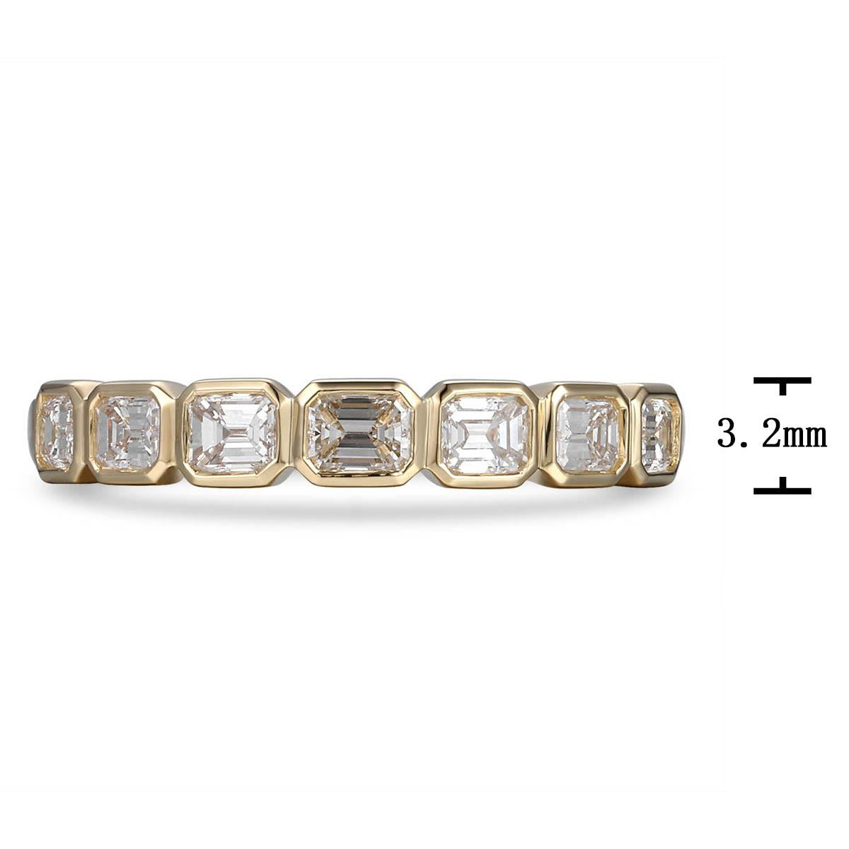 0.69ct tw Emerald Cut Diamond Bezel Set Half Eternity Band