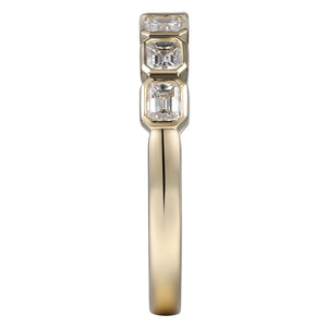 0.69ct tw Emerald Cut Diamond Bezel Set Half Eternity Band