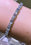 Blue Topaz Oval Stone & Diamond Tennis Bracelet