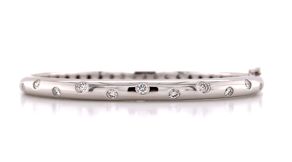 0.55ct tw Burnish Set Diamond Station Bangle Bracelet